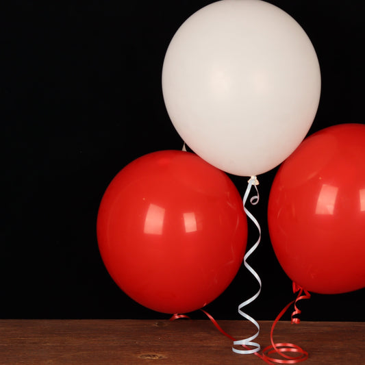 Red and white balloon trio