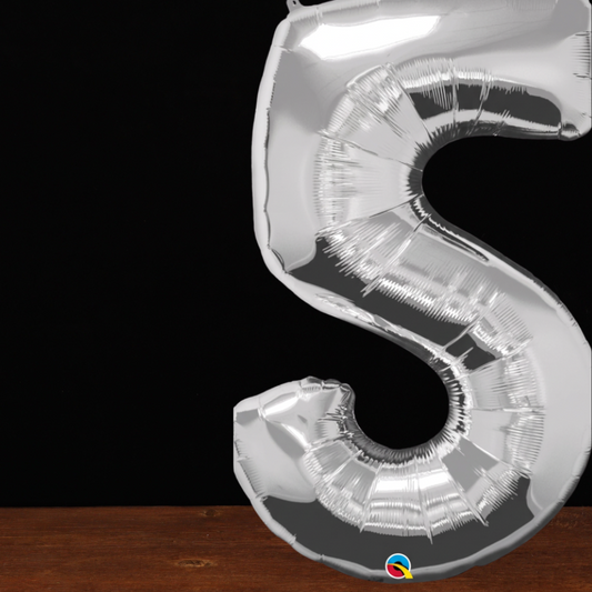 Close view of the giant silver number 5 foil balloon