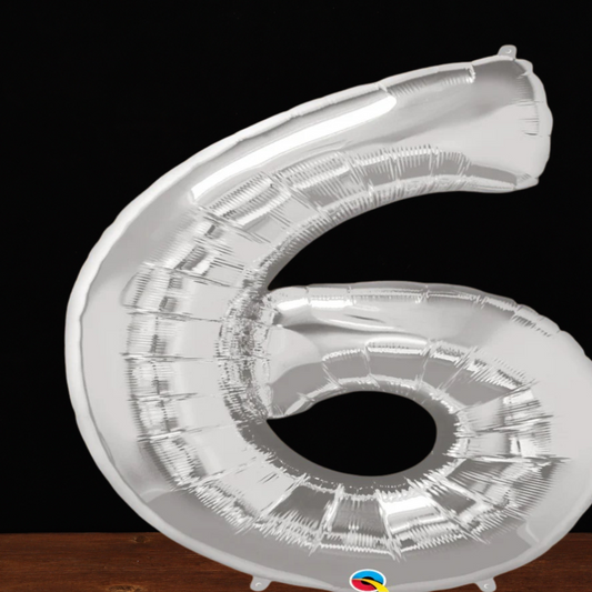 Close view of the giant silver number 6 foil balloon