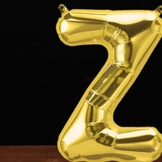 Close view of the giant gold letter Z foil balloon