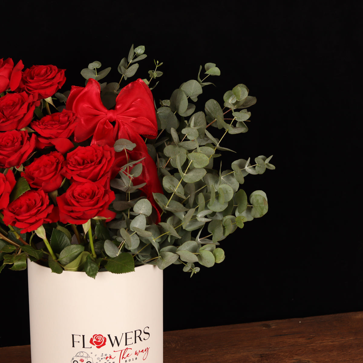 Duet of Love Floral – red roses and eucalyptus in white cylinder box, alternate view, Valentine's Day flower delivery Dubai