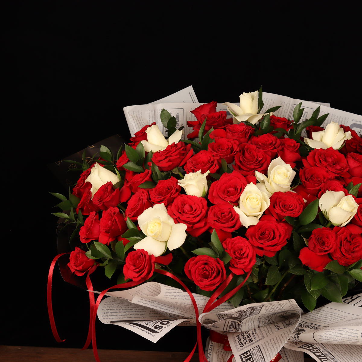Pure Passion Symphony – 50 red and white roses with ruscus, alternate view, Valentine's Day flower delivery Dubai