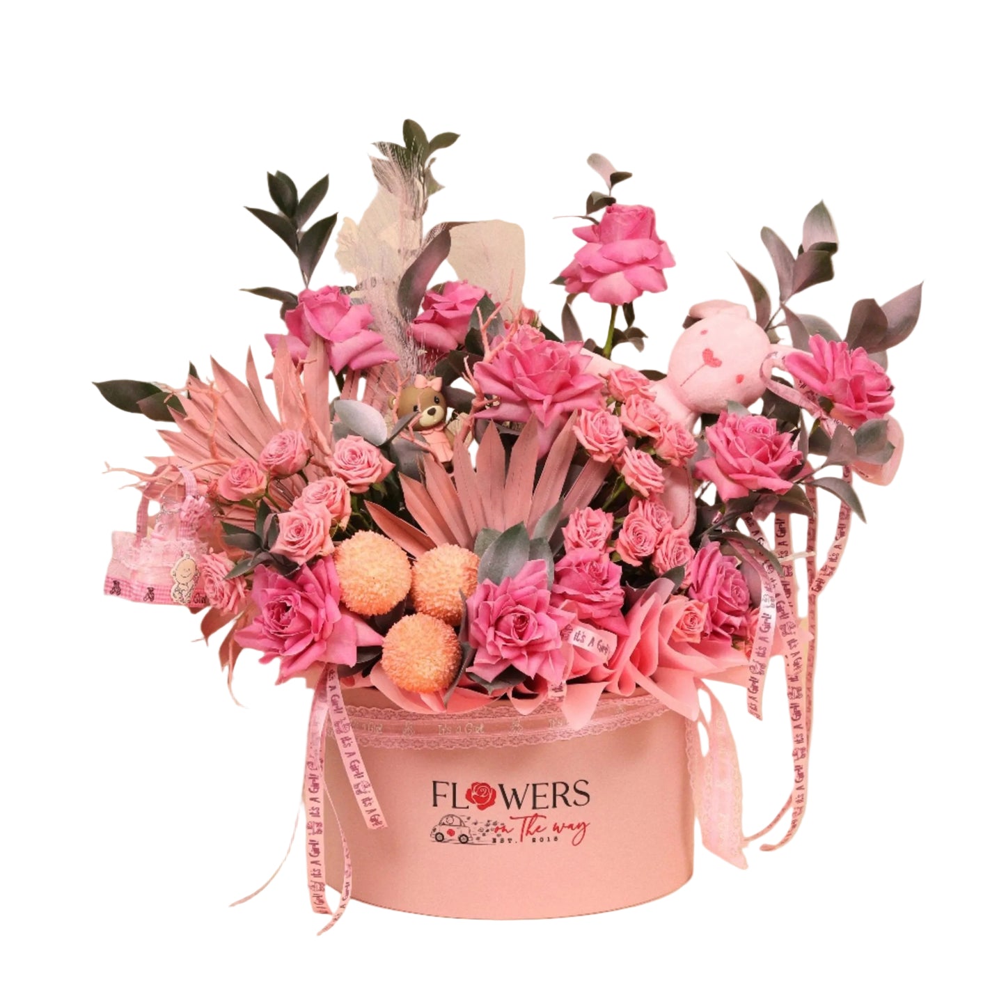 Blossom Tale is a soft and charming baby girl box arrangement designed to celebrate a new arrival with beauty and love. The pink box is filled with pink roses and baby pink spray roses, elegantly arranged alongside delicate baby girl-themed accessories, and topped with a small pink teddy bear for a cozy, heartfelt touch.
A perfect gift for a newborn baby girl or as a sweet addition to a baby shower setup. Handcrafted with fresh flowers and available for same-day delivery in Dubai.