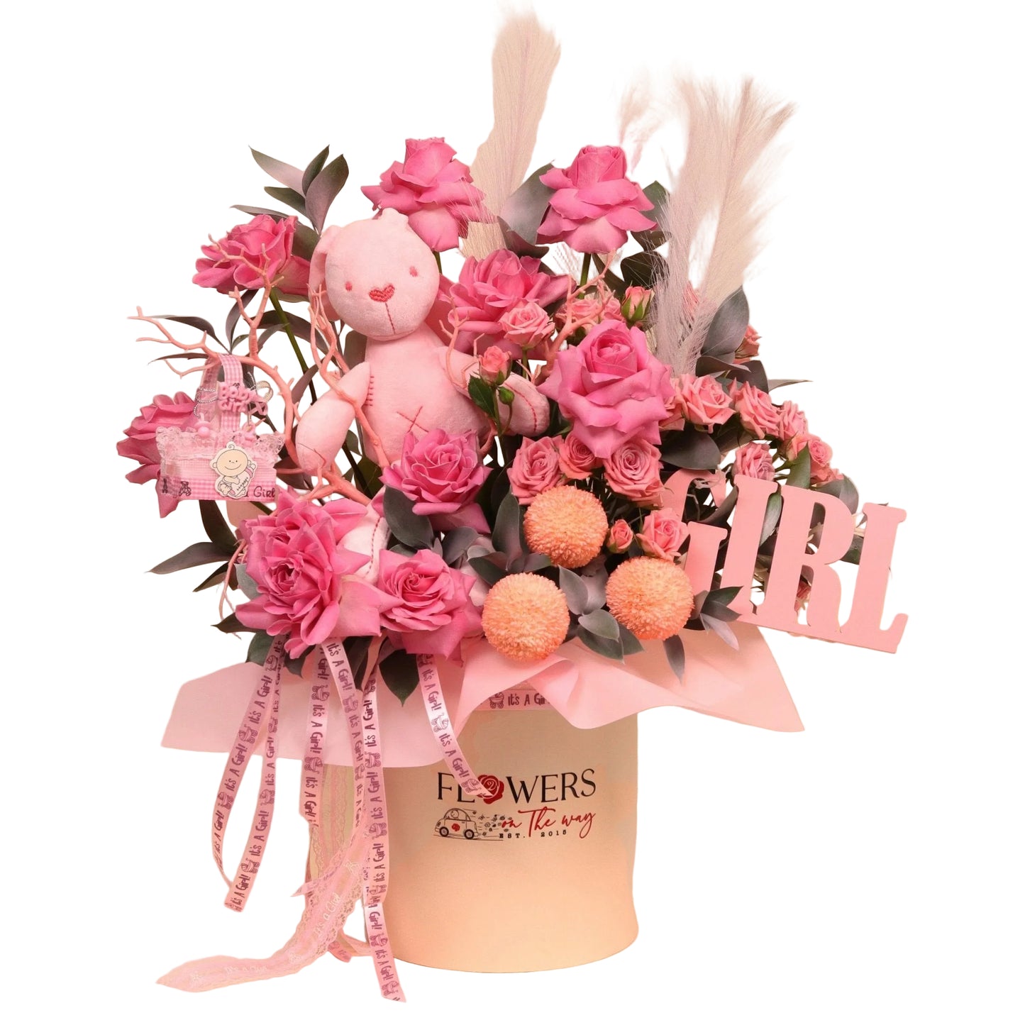 Angel Touch is a premium floral arrangement created to welcome a precious baby girl. It features a soft blend of pink flowers such as roses and carnations, delicate baby girl-themed accessories, a cute pink teddy bear, and a stylish pink wooden “Baby Girl” stand that completes the setup with a decorative touch.
Perfect as a thoughtful gift for a newborn or a centerpiece for baby showers. Hand-arranged with fresh flowers and available for same-day delivery in Dubai.