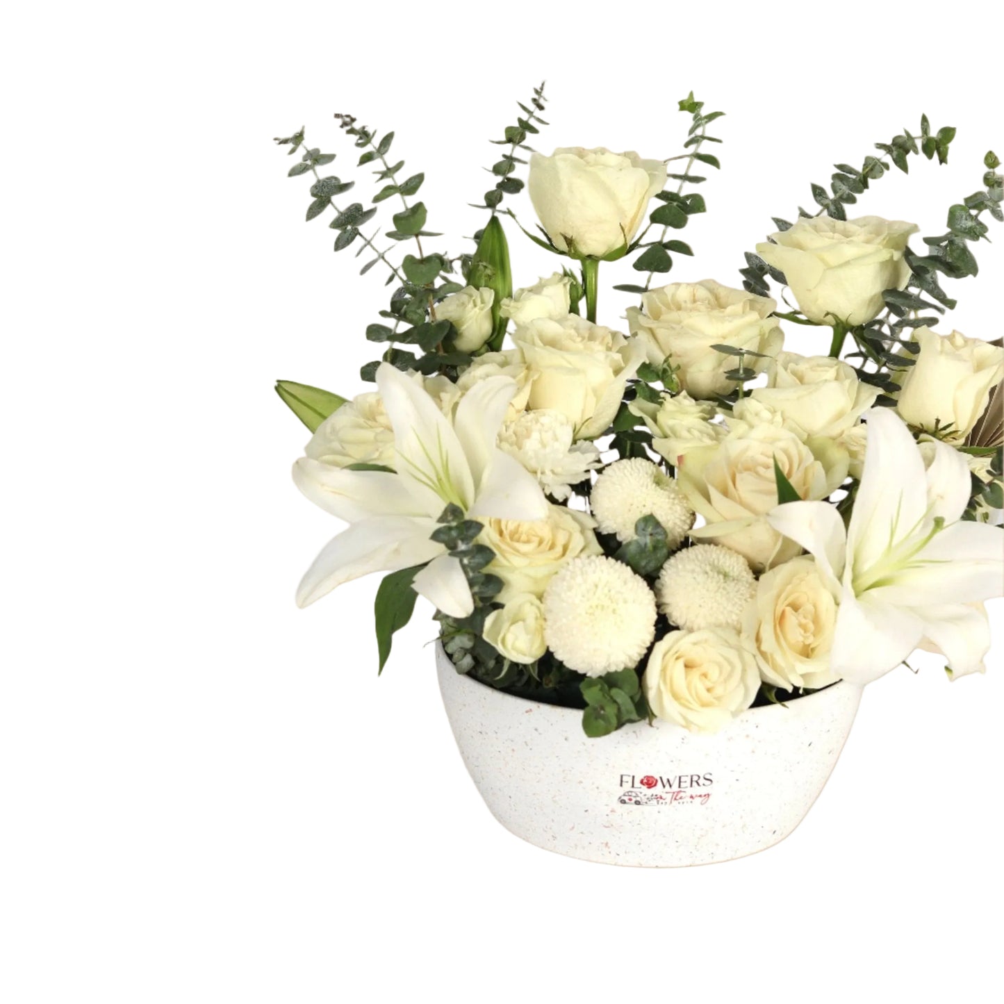 A premium white box elegantly arranged with white roses, white lilies, and pure white chrysanthemums — hand-designed to radiate timeless grace, serenity, and purity. An ideal gift for engagements, moments of gratitude, or respectful occasions.