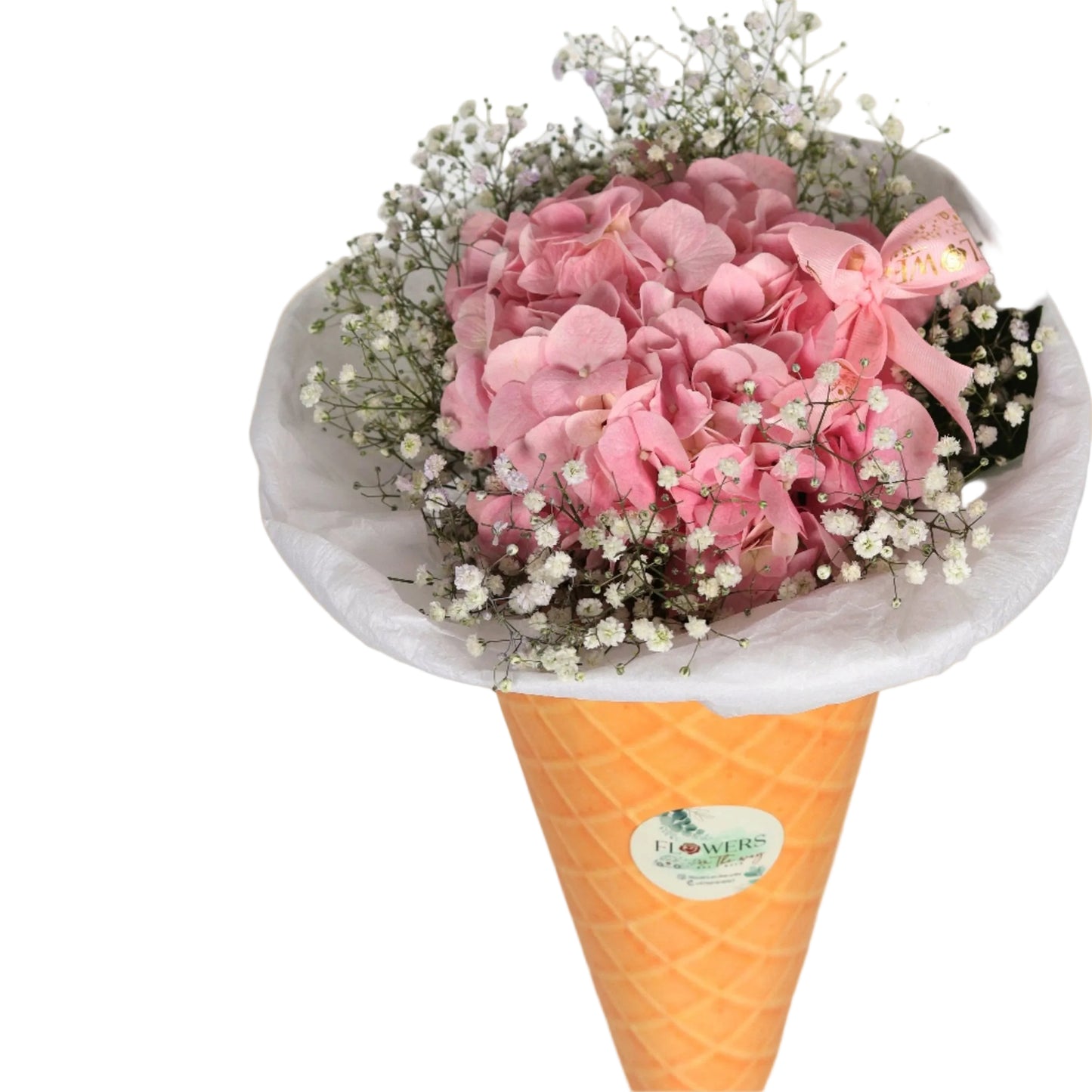 A whimsical and elegant bouquet styled like an ice cream cone, crafted with soft pink hydrangea blooms. A charming gift idea that blends fun and floral beauty – perfect for birthdays, sweet gestures, or stylish surprises.Flowers On The Way