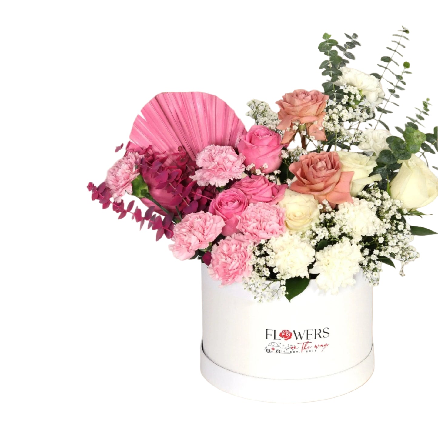 An elegant arrangement in a luxurious white box, featuring the delicate beauty of white and pink carnations, pure white roses, and warm cappuccino roses. Enhanced with soft pink accessories that add a feminine and graceful touch, making it an ideal gift for upscale occasions and special moments.