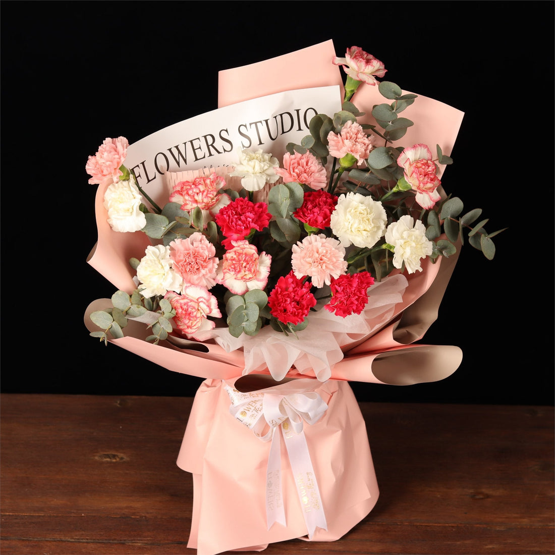 Pink carnation and eucalyptus bouquet, among the longest-lasting cut flowers in Dubai