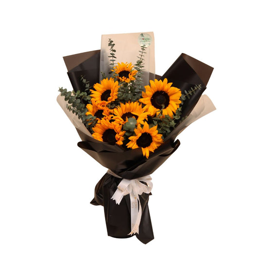 Experience the Charm of Branches with this radiant sunflower bouquet — a cheerful arrangement that brings a burst of sunshine into any space. Each golden bloom stands tall as a symbol of happiness, positivity, and vibrant energy.

Send a little sunshine their way — a joyful gift, freshly delivered across Dubai.