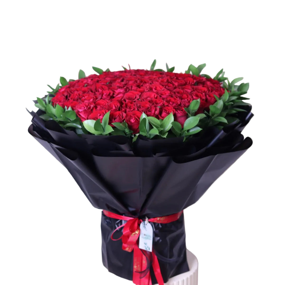 Make a grand statement with our 100pcs Upperclass Red Roses with Fresh Ruscus, elegantly hand-tied in a luxury black wrapping. This premium bouquet is designed for unforgettable moments—perfect for anniversaries, romantic surprises, proposals, and special celebrations.
Featuring rich velvety red roses paired with lush ruscus greenery, this arrangement delivers depth, elegance, and timeless beauty.
Enjoy fast and reliable delivery across Dubai, ensuring your gift arrives fresh and flawless.