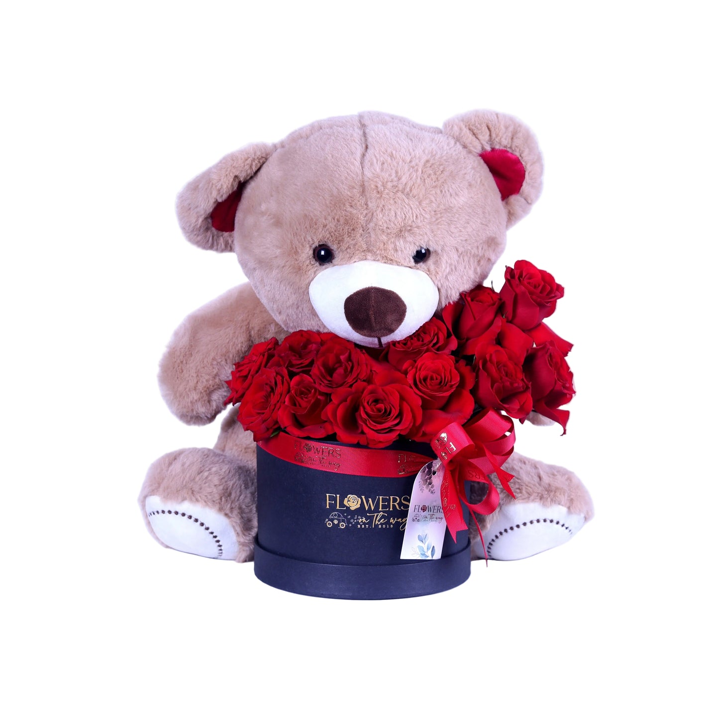 Create a romantic moment to remember with our Red Rose Arrangement with Eucalyptus and Teddy Bear in a Small Black Box. This elegant floral gift features fresh red roses beautifully accented with soft eucalyptus, paired with an adorable teddy bear and presented in a stylish black box for a modern, luxurious look. Perfect for Valentine’s Day, anniversaries, birthdays, romantic surprises, or special occasions, this arrangement blends love, warmth, and charm in one unforgettable gift.