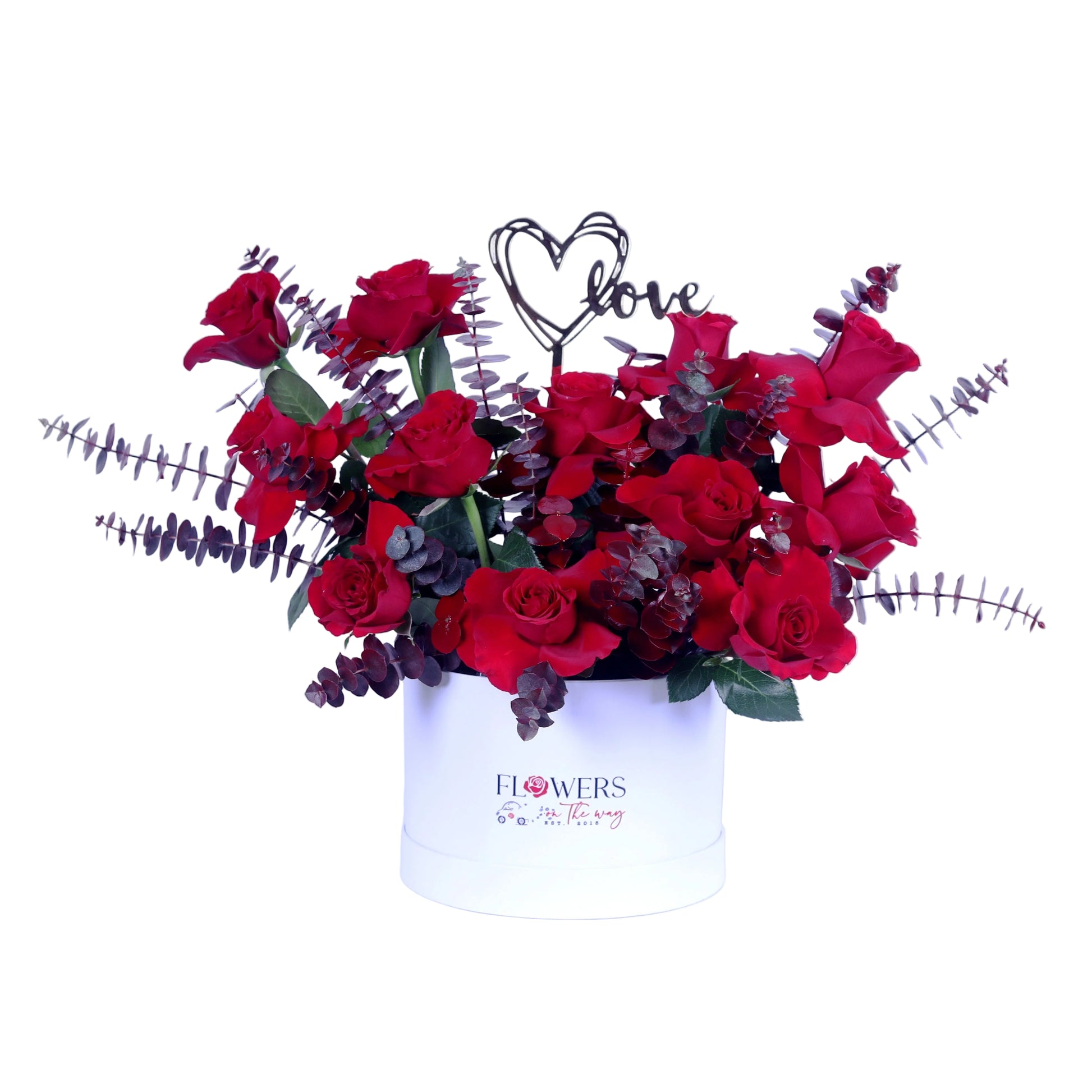 Express timeless love with our 12 Red Roses with Eucalyptus in a Small White Acrylic Box. This elegant arrangement features a dozen fresh red roses beautifully paired with soft eucalyptus, all showcased in a modern transparent acrylic box with a clean white finish. Perfect for Valentine’s Day, anniversaries, romantic surprises, birthdays, or special celebrations, this luxurious floral box combines classic romance with contemporary design.