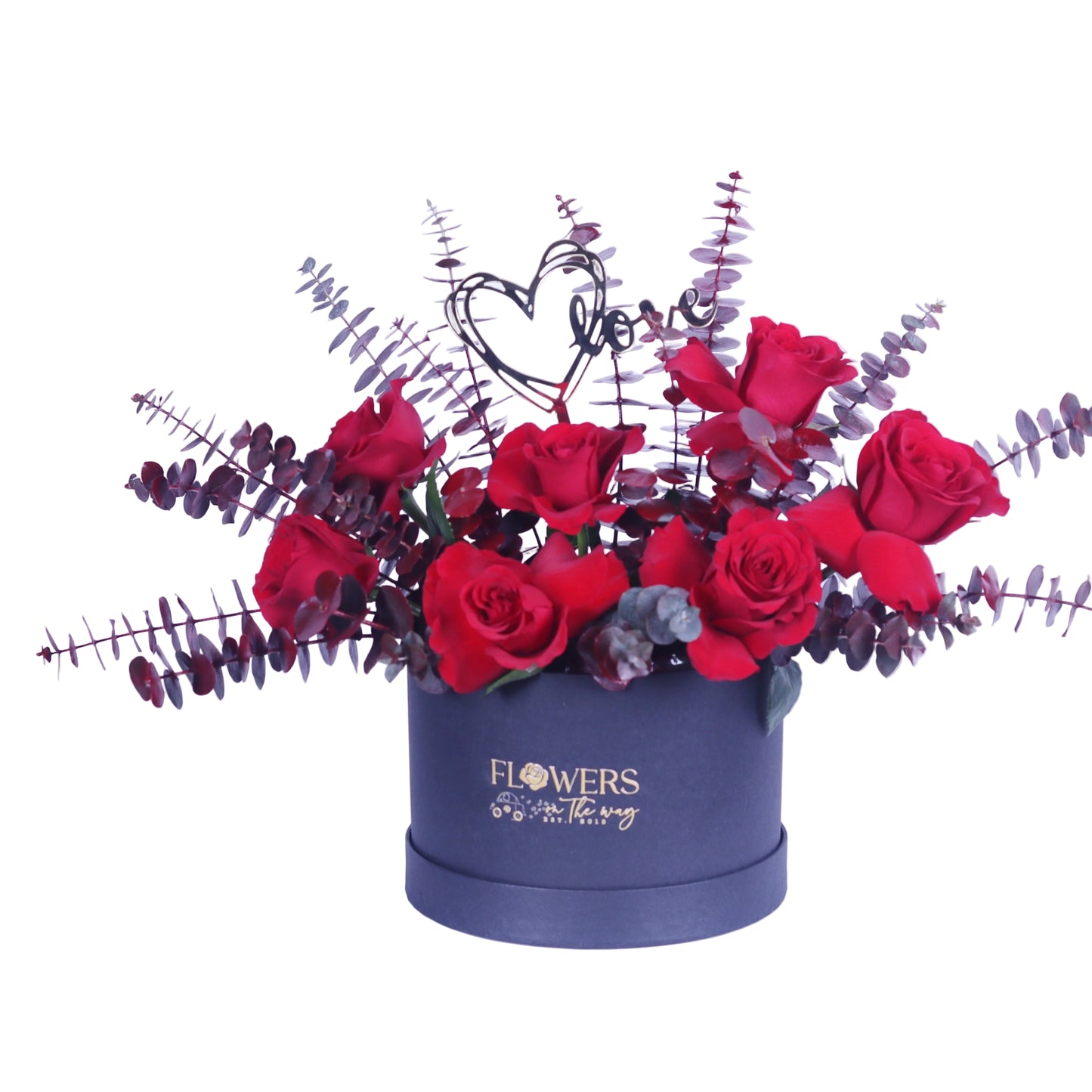 Express your love in a bold and elegant way with our Red Rose Arrangement with Eucalyptus and Acrylic Heart in a Small Black Box. This stunning floral design features fresh red roses beautifully paired with rich red eucalyptus and finished with a stylish acrylic heart, all presented in a chic black box for a modern, luxurious touch. Designed using premium fresh flowers, it’s an ideal gift for creating unforgettable moments and meaningful expressions of love.