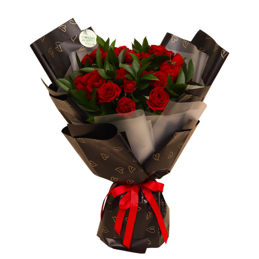 Bask in the Floral Glow of this luxurious red rose bouquet. A true symbol of passion and grandeur, each rose is hand-selected for its rich, velvety crimson petals and perfect full bloom — a timeless gesture of love and admiration.

A radiant declaration of love — bold, elegant, and delivered with unforgettable charm across Dubai.