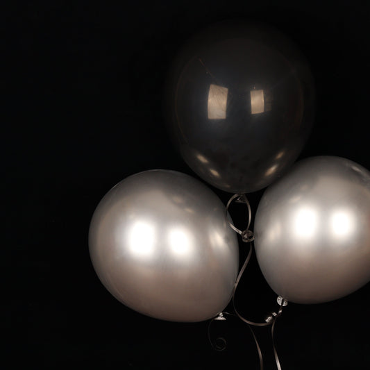 Trio of black and silver balloons