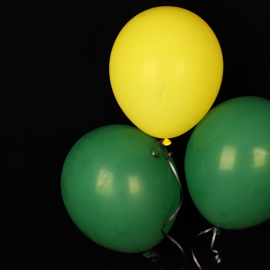 Trio of yellow and green balloons
