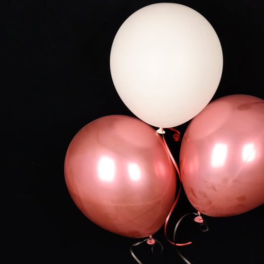 Rose gold and white balloon trio