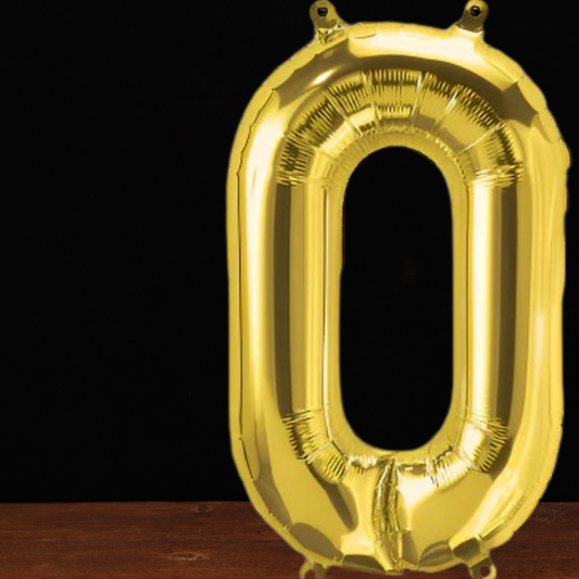 Close view of the giant gold number 0 foil balloon