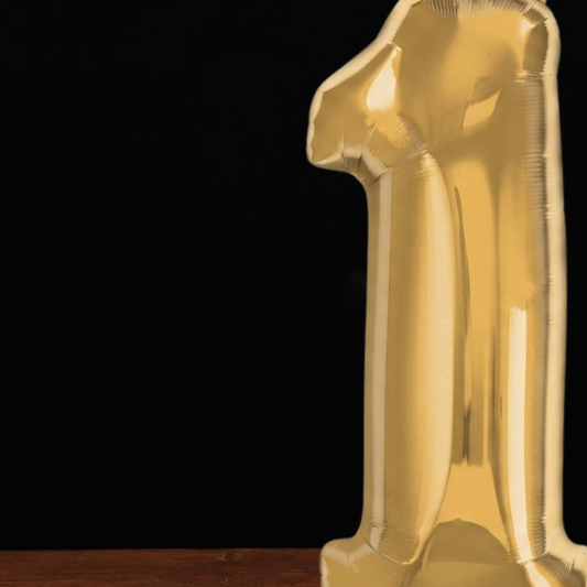 Close view of the giant gold number 1 foil balloon