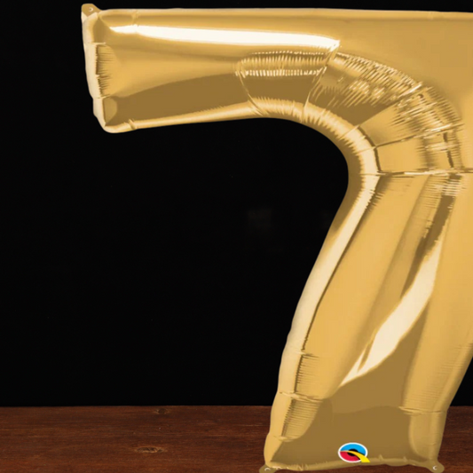 Close view of the giant gold number 7 foil balloon