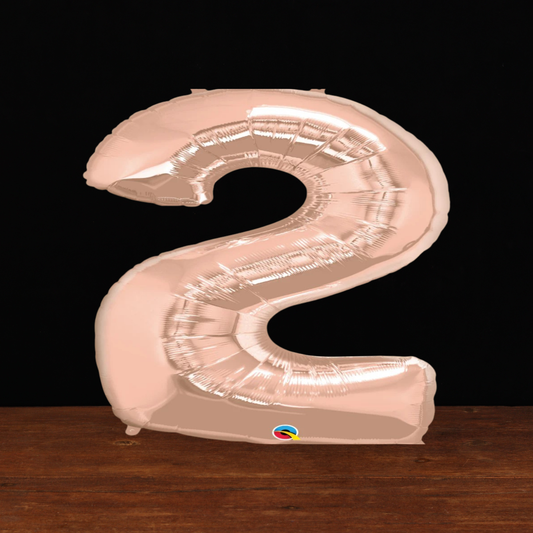 Close view of the giant rose gold number 2 foil balloon