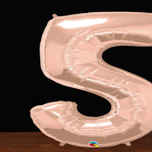 Close view of the giant rose gold number 5 foil balloon