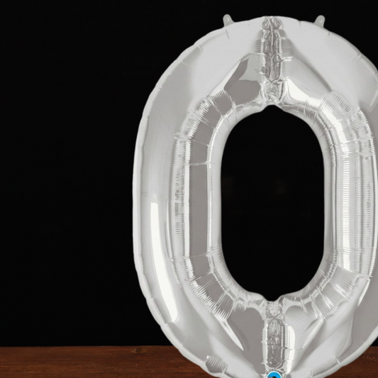 Close view of the giant silver number 0 foil balloon