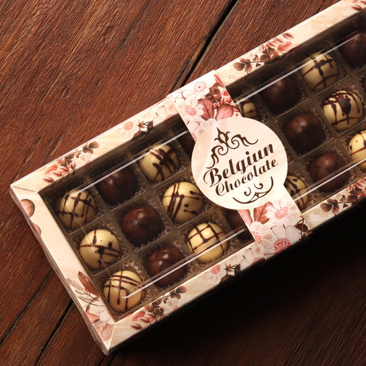 Open Belgian chocolate selection box, angled view
