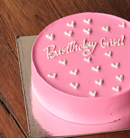 Pink Birthday Girl cake with pearl detailing, side view
