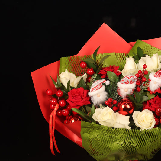 Crimson & Pine Holiday Bouquet - close-up of red and white roses and mini Santas, Christmas bouquet Dubai