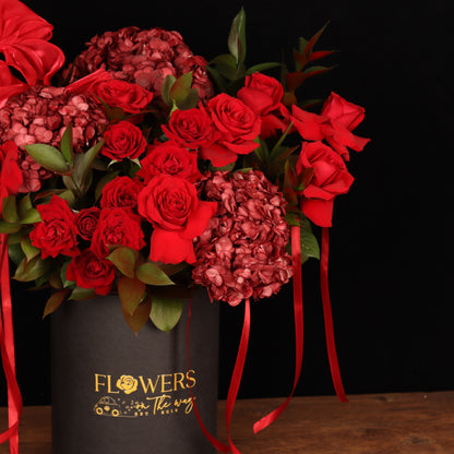 The Rose Melody – burgundy hydrangeas and red roses in dark box, alternate view, Valentine's Day flower delivery Dubai