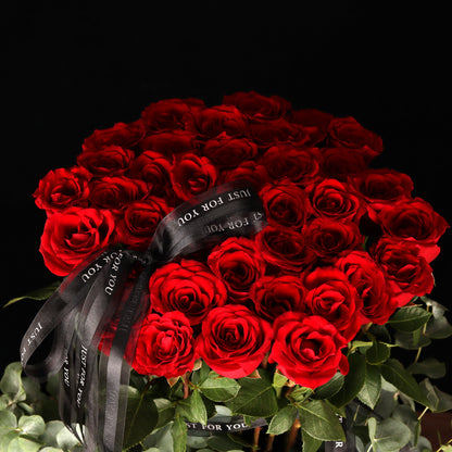 Romance 40-Rose Tower – 40 red roses dome in black cylinder box, alternate view, Valentine's Day flower delivery Dubai