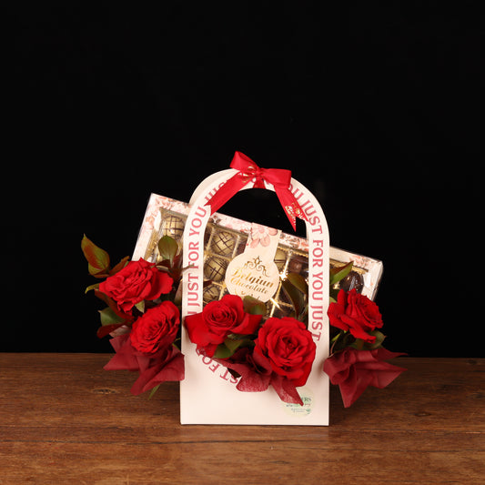 Passion & Truffle Gift – red roses and 24 Belgian chocolates with red bow, Valentine's Day flower delivery Dubai