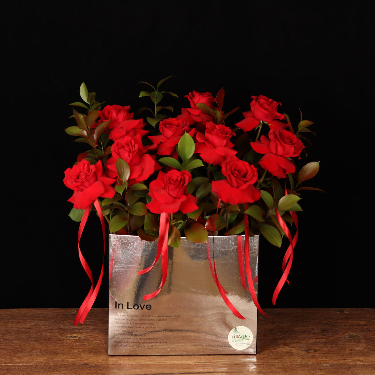 Silver Reflection In Love – red roses in mirror-finish silver “In Love” box, Valentine's Day flower delivery Dubai
