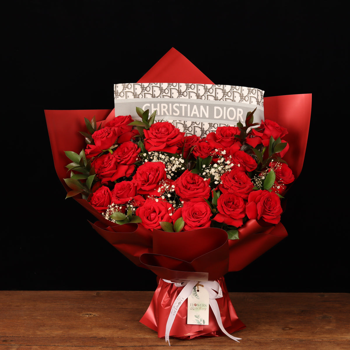 Couture Romance Bouquet – 20 red roses with baby's breath in crimson wrapping, Valentine's Day flower delivery Dubai