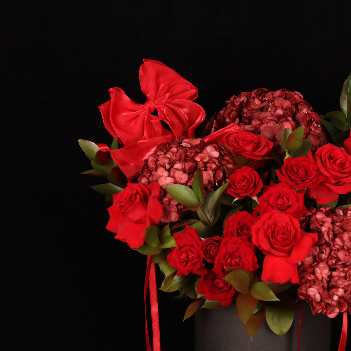 The Rose Melody – burgundy hydrangeas and red roses in dark box, alternate view, Valentine's Day flower delivery Dubai