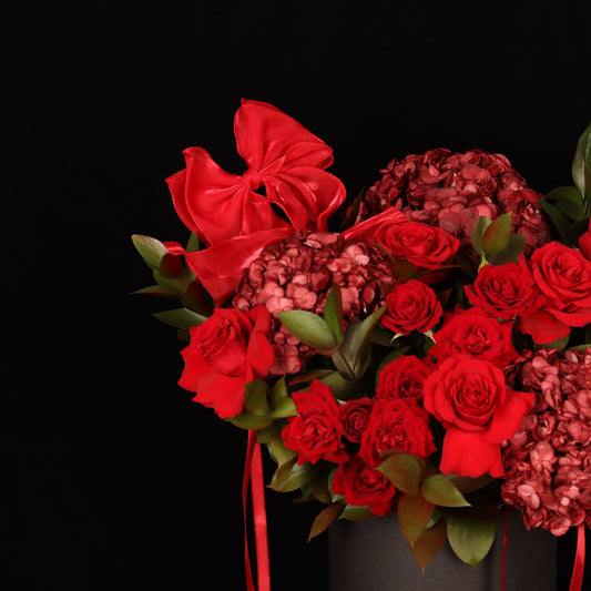 The Rose Melody – burgundy hydrangeas and red roses in dark box, alternate view, Valentine's Day flower delivery Dubai