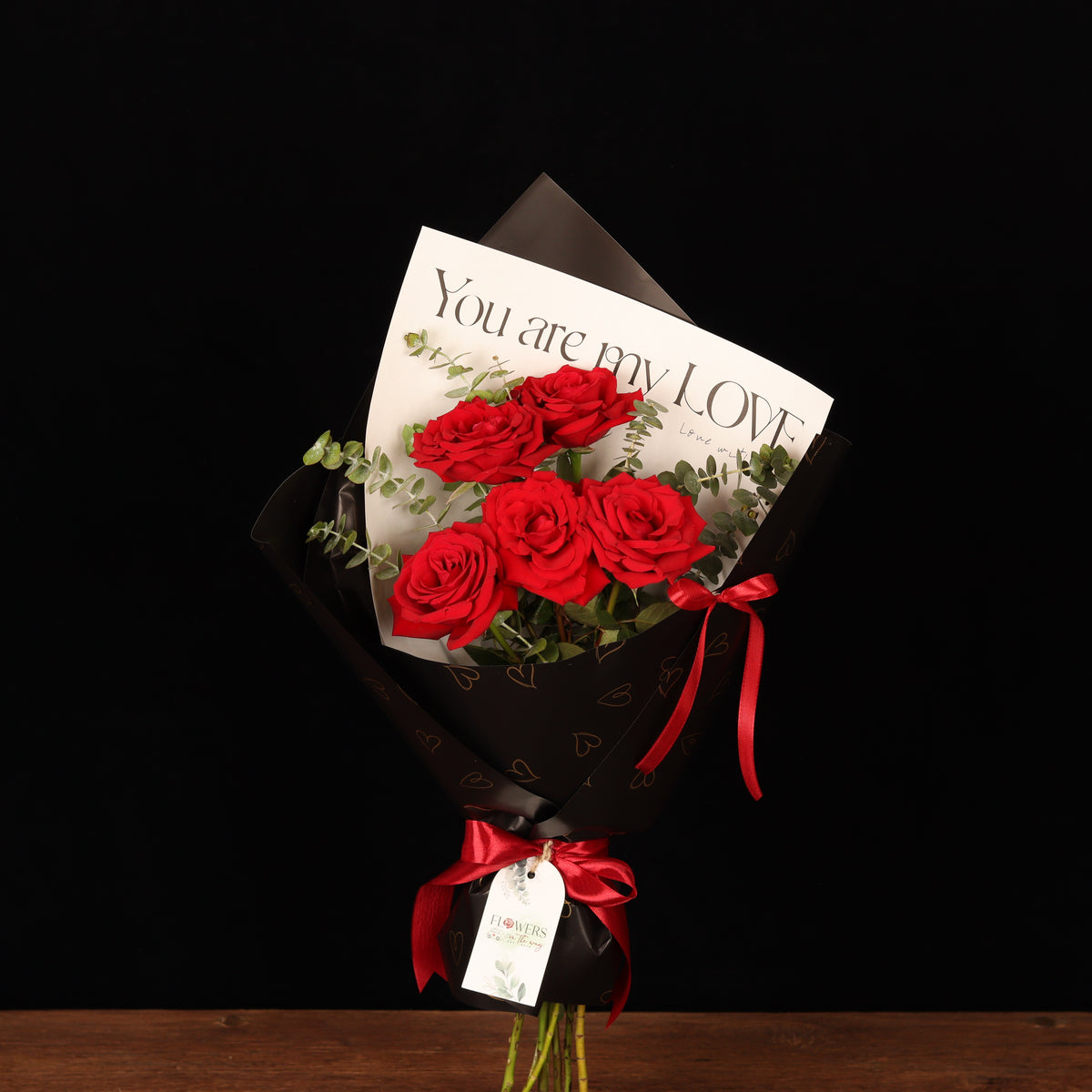 Romance Rose Bouquet – red roses in transparent wrapping with satin bow, Valentine's Day flower delivery Dubai
