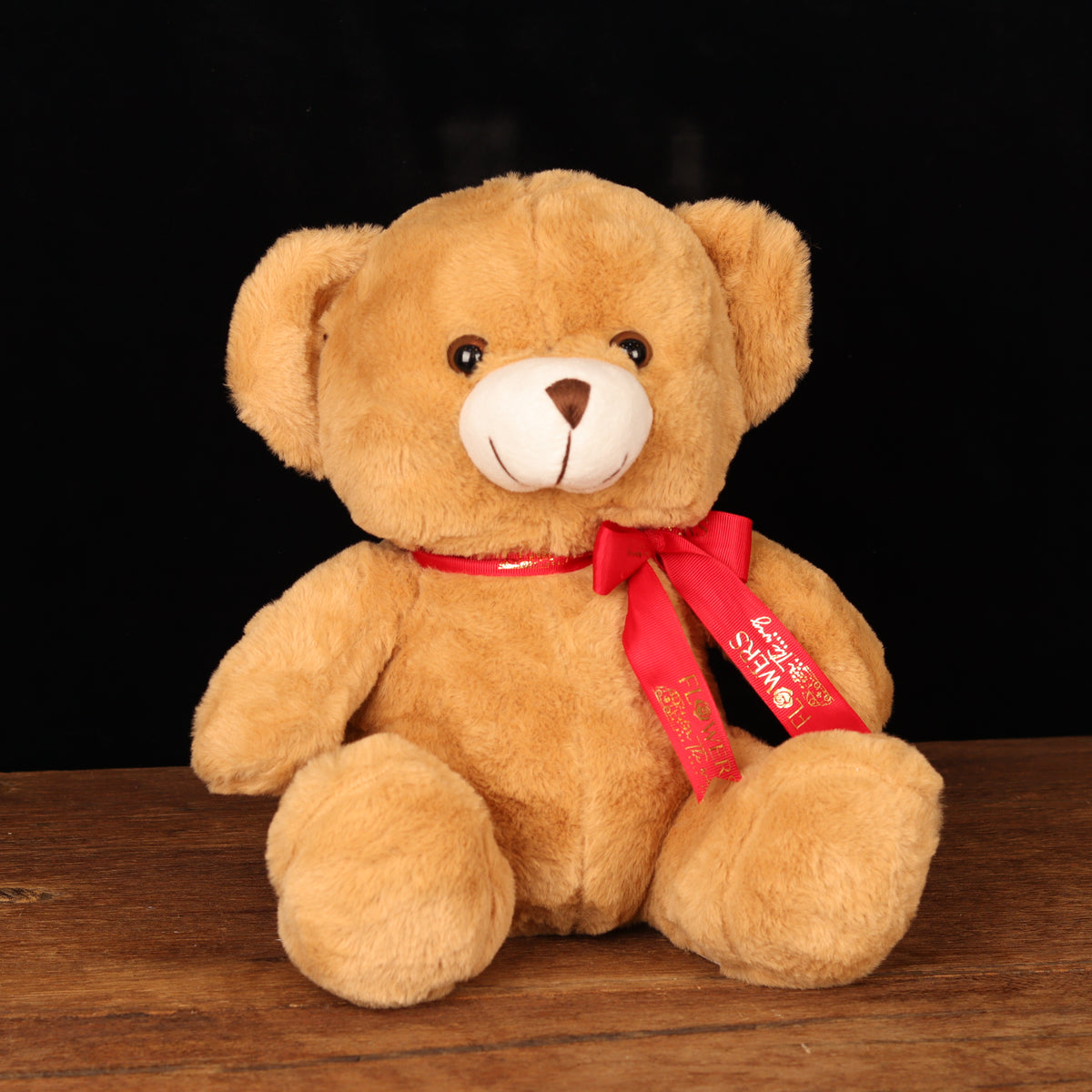 Cuddle Bear Love – 30 cm brown teddy bear with red ribbon bow, alternate view, Valentine's Day flower delivery Dubai