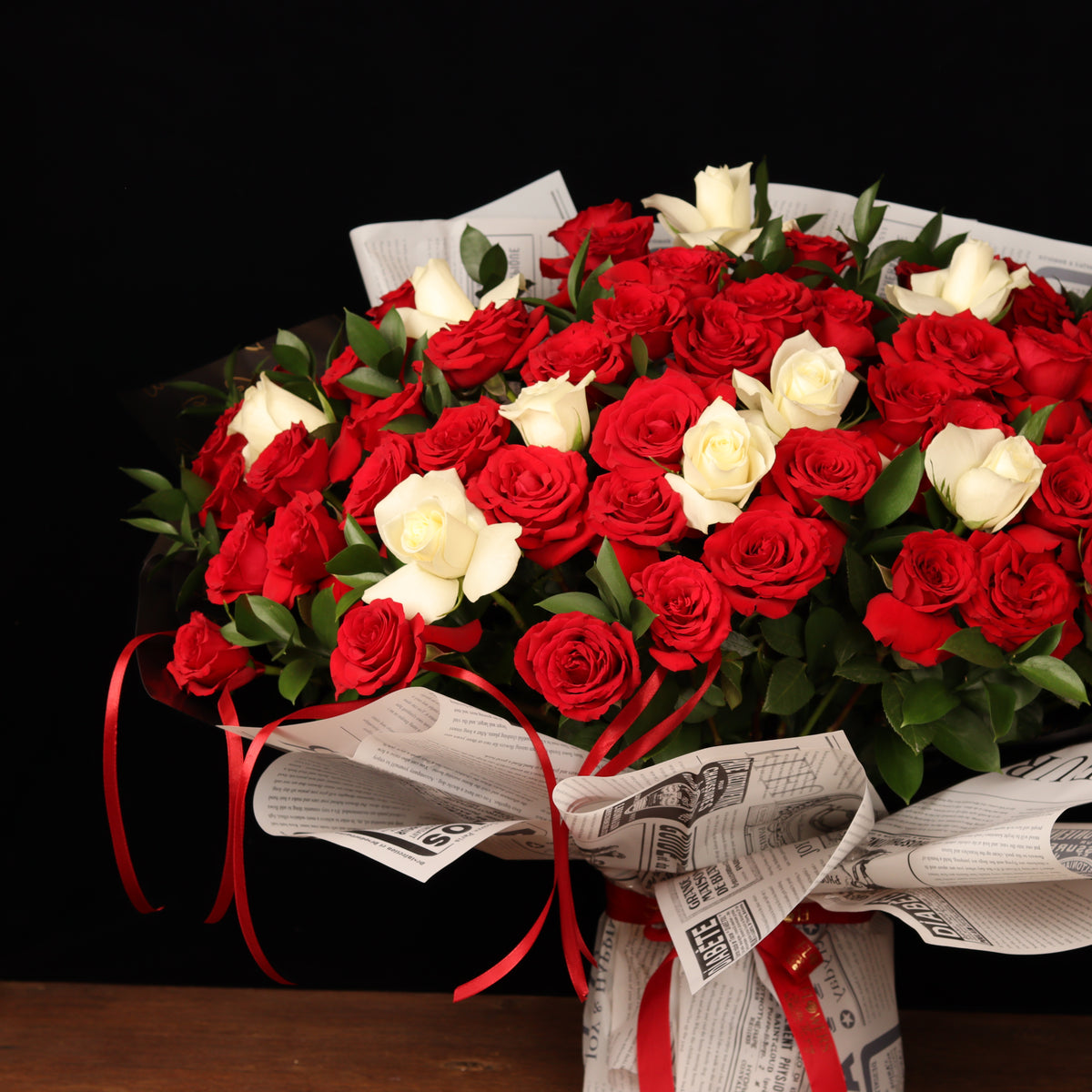 Pure Passion Symphony – 50 red and white roses with ruscus, alternate view, Valentine's Day flower delivery Dubai