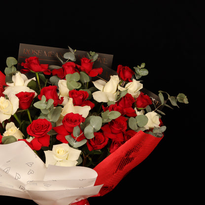 Hearts Entwined Bouquet – red and white roses with silver-green eucalyptus, Valentine's bouquet Dubai