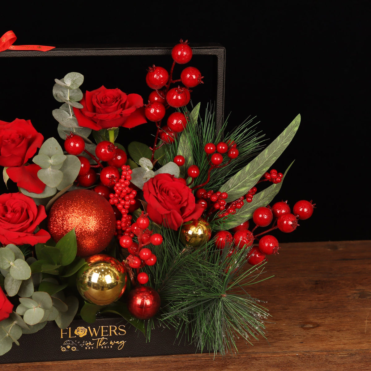 Royal Framed Holiday - close-up of red roses, red berries and gold ornaments, Christmas flower box Dubai