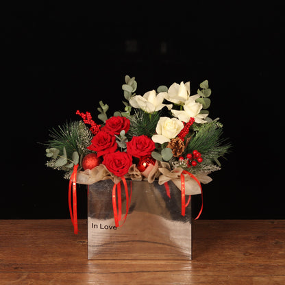 Starlight Elegance Bag - white and red roses with frosted pine in a silver In Love gift bag, Christmas gift flowers Dubai
