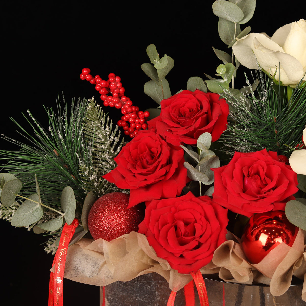 Starlight Elegance Bag - red roses and red ornaments in a silver gift bag, Christmas flowers Dubai